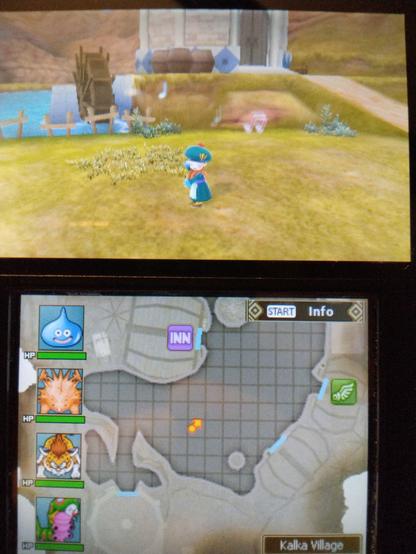 Photo of a 2DS, showing Dragon Quest Monsters with a map at the bottom and Tara dancing on the top screen.