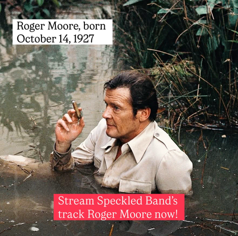 Roger Moore smoking a cigar while partially submerged in water