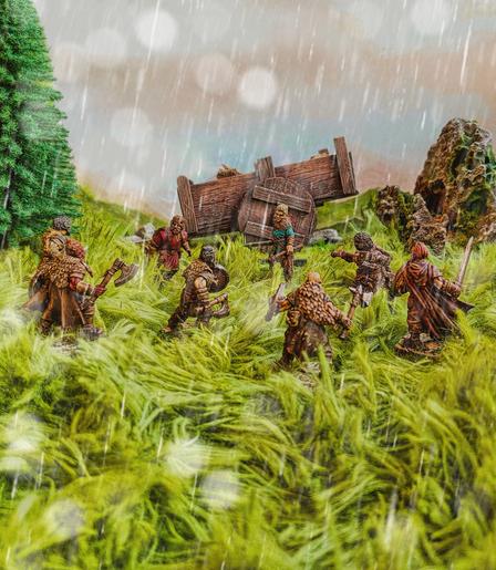 Hildur and Frodi defend the caravan. 28mm miniatures.