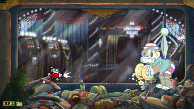 Screenshot from a flying level in the game cuphead.
The player pilots a 50's style red plane shooting at a toy monkey clanging cymbals as it is suspended by the claw of a ufo catcher game.