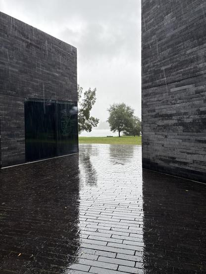 Heavy rain outside a modernist building in Furnas, Sao Miguel, Azores.