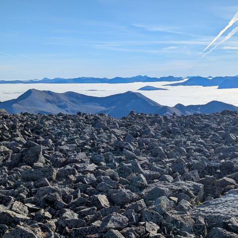 Mountains poking up through the clouds