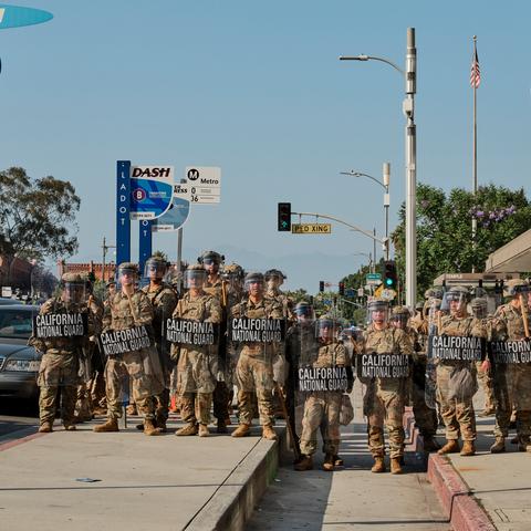 California National Guard members stand ready as people protest against the detention of migrants by federal law enforcement in downtown Los Angeles in June.