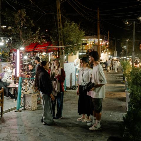 Young Iranians gathering in the Darband neighborhood of Tehran in July.