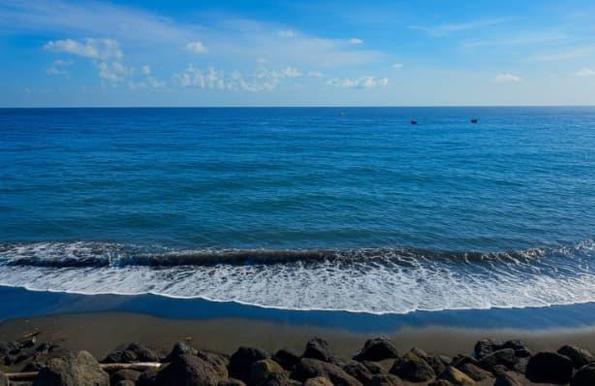 Sandy Point’s Black Sand Beach St. Kitts - Nevis.