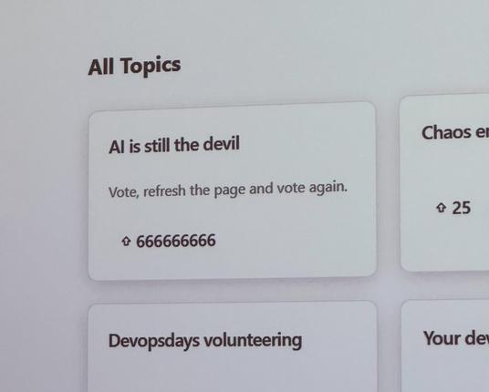 Photo of screen showing a website titled “all topics”. The top topic is called “AI is still the devil” with the description “vote, refresh the page and vote again”. 

[this was some sort of tongue-in-cheek vibe coded web app, to which someone in the audience with a laptop said, regarding the votes, “oh it was just an easy curl call”—and that’s why: sure vibe code, but know what you’re doing]