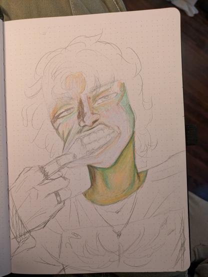 Starting the coloring in my zombie drawing, he's got his finger hooked in his cheek, greenish skin, and fluffy hair.