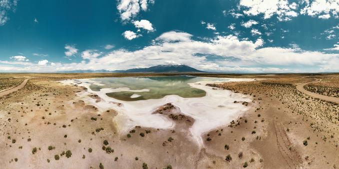 An aerial photograph of wetlands by the Sangre de Cristo mountain range in Colorado

DJI Air2S