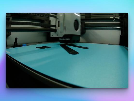Screenshot of the printer camera printing the NeXT MegaPixel Display stand. There are just a few layers printed atm.