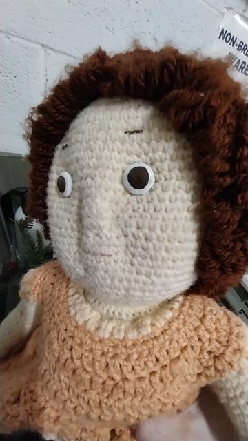 Uncomfortable closeup of a crochet (?) doll