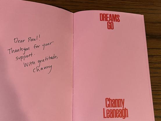 The lyric book is open to the first page, with an inscription: "Dear Paul! Thank you for your support.  With gratitude, Channy"