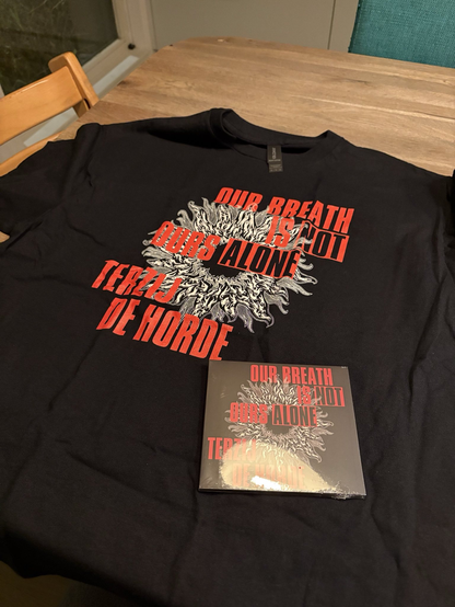 Photo of a black Tshirt and a CD layed out on the table. Bot adorned with the artwork from the album "Our Breath Is Not Ours Alone' by Terzij De Horde.

A stylised flaming ring with bright right capital letters stating album name and band.