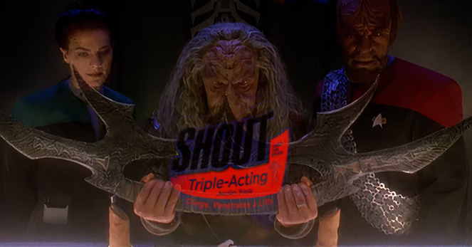 Jadzia and Worf look on as Kor picks up the Sword of Kahless. Overlayed is the Shout sprain stay logo and the text triple action, clings, penetrates, lifts.