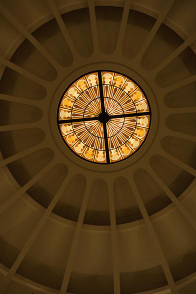 A colourful window atop the dome of the Samuel Way Building in Adelaide.