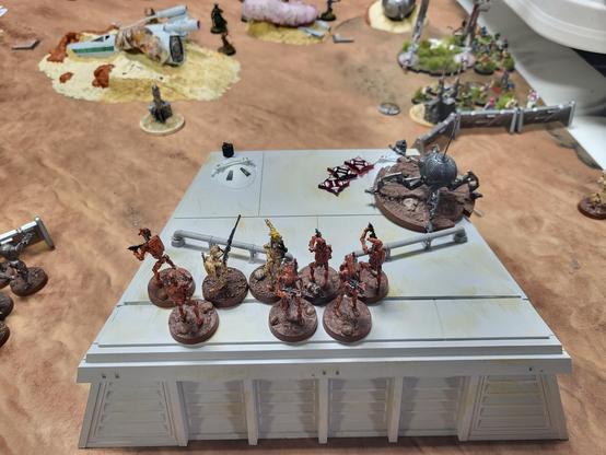 Dwarf spider and B1 battle droid minis sniping ewoks from the roof of a bunker (they're about to die without killing anything, though).