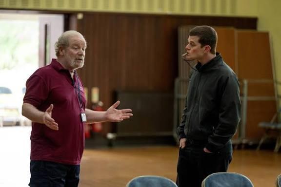 Peter Mullan's caretaker Tommy Trotter takes Richard Aramayo's Tourettes sufferer John Davidson under his wing in I Swear - a film that celebrates empathy and kindness.