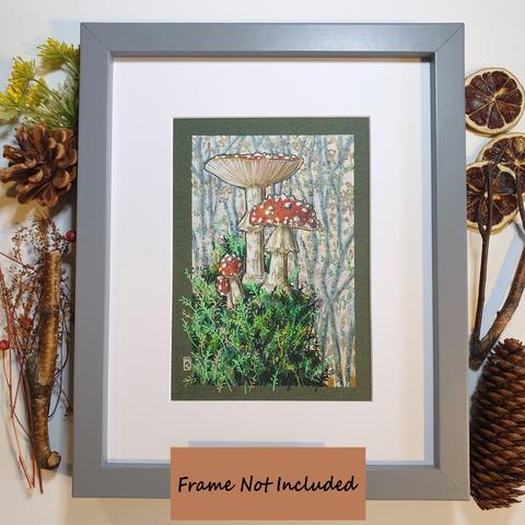 A small colour drawing of red and white fly agaric mushrooms on a mound of earth covered in mosses deep in the forest.
Fly agaric is native to the UK. It grows in woodland and heathland on light soils among birch, pine or spruce.
An original art work, please note that the frame is not included.
Colour pencil and mixed media on acid free toned artist paper
5 by 7 inches (12.7 by 17.8 cm).