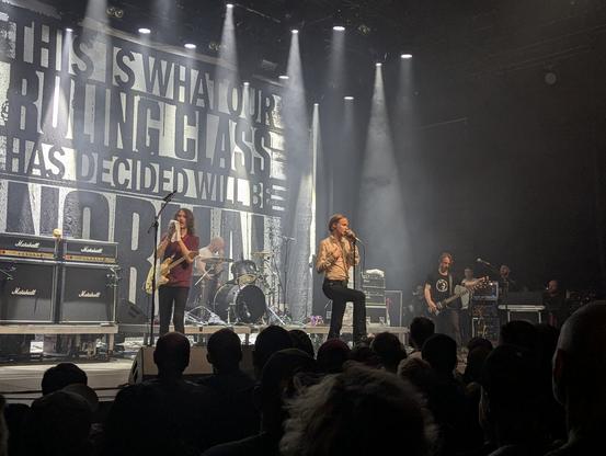 Photo of the Swedish hardcore punk band Refused on stage in Munich, 2025.