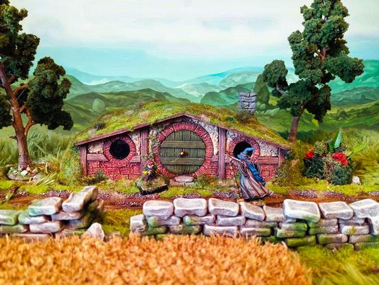 A halfling home in 28mm. Learn more about this people in the stories of “The Tales of Hildur of Greikar”.