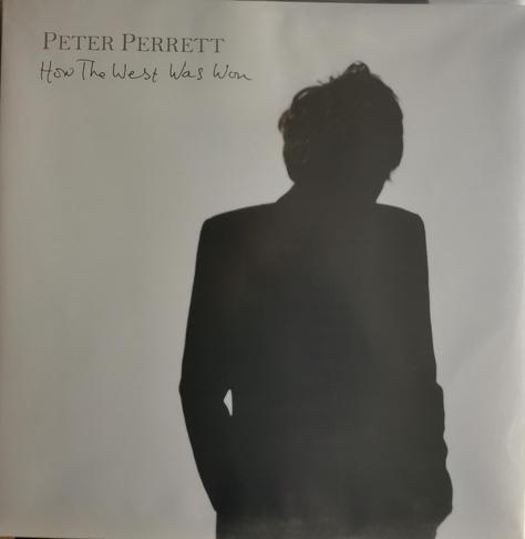 LP cover for How The West Was Won by Peter Perrett. Cover has artist name and LP title in top left corner. Rest of cover is white other than the back of an image of Peter which is in black.