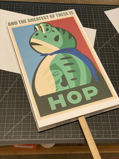 Other side of the same protest sign with the Portland Frog HOP sign, captioned on top to make it be "AND THE GREATEST OF THESE IS HOP" which is yes a Red Dwarf riff but which I think works just fine standalone as well.