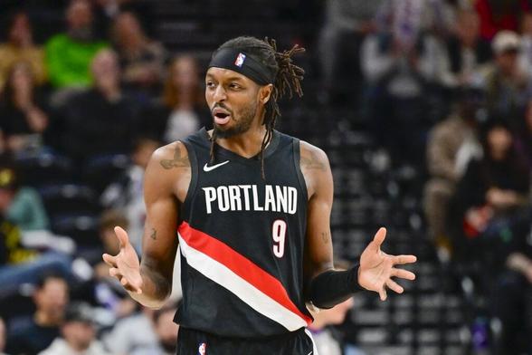 Oct 16, 2025; Salt Lake City, Utah, USA; Portland Trail Blazers forward Jerami Grant (9) questions a call during the second half against the Utah Jazz at Delta Center. Mandatory Credit: Peter Creveling-Imagn Images