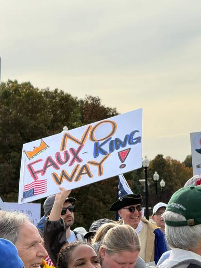 Photo by George Conway on October 18, 2025. May be an image of standing, crowd and text.