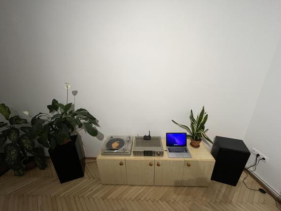 My music system with turntable, amplifier, and the newly repaired MacBook next to them.