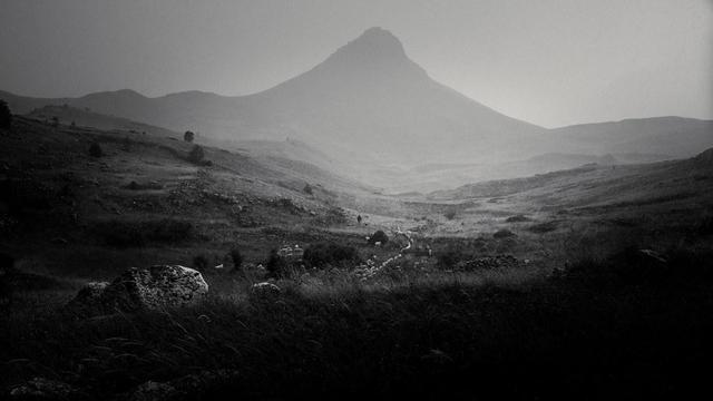 Shepherd and his flock on Campo Imperatore.

Abruzzo, Italy.