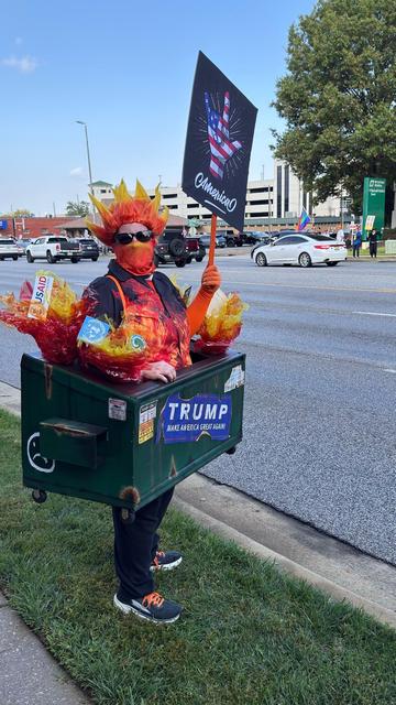 No Kings Dumpster Fire protestor outside Huntsville Alabama Blackwell Medical Tower