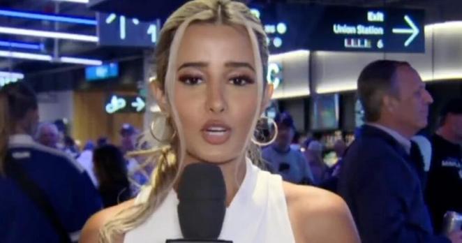 NHL reporter Anna Dua wipes out in front players in Toronto