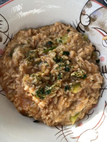 A bowl of reddish risotto
