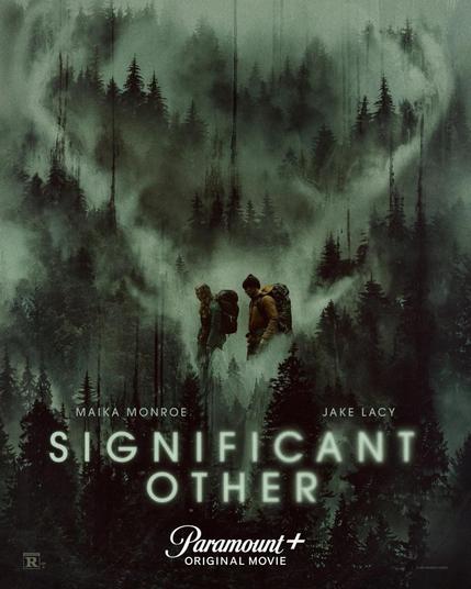Poster for the horror-SF film Significant Other, showing a couple backpacking, surrounded by ominous, misty, dark, green forestry