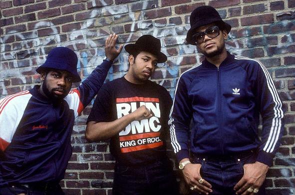 Publicity still of Run DMC from their peak, meant to evoke their immortal "Kings from Queens"