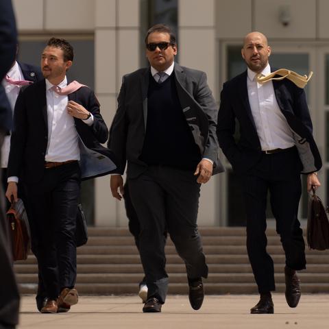 George Santos, seen leaving federal court after his sentencing, said on TV that he didn’t care about the “pearl clutching” of those who were critical of his release.