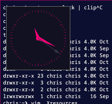 An analogue clock in the corner of an i3 desktop.