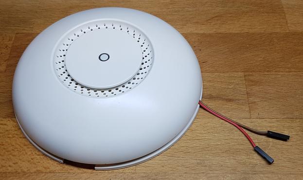 my macGyvered MikroTik cAP ac with the PoE-in tap routed out the side