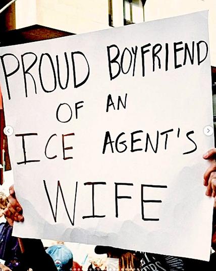 protest sign that says proud boyfriend of an ice agent's wife