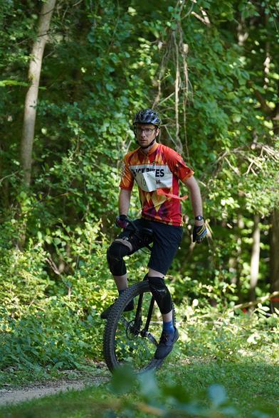 riding muni on my 29” unicycle. i have a race number on my chest. all photos courtesy of adin thiemann photography