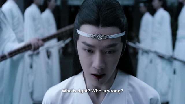 Close in shot focusing on Lan Wangji, shown from the shoulders up, with Lan disciples lined up in opposing rows behind him to either side. One final disciple is partially shown at the left edge of the image, wielding discipline canes. Wangji, a trail of blood spilling out of his mouth, asks:

Who is right? Who is wrong?
