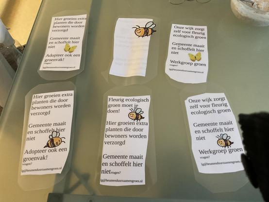 a bunch of laminated signs to put in the greenery