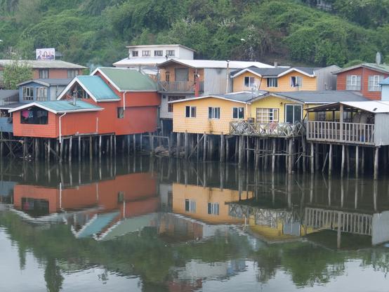 Colourful fishing houses on stilts from Chiloé.