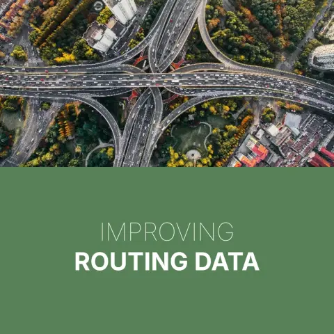 Photo of a freeway/arterial interchange from above. Below text "Improving routing data".