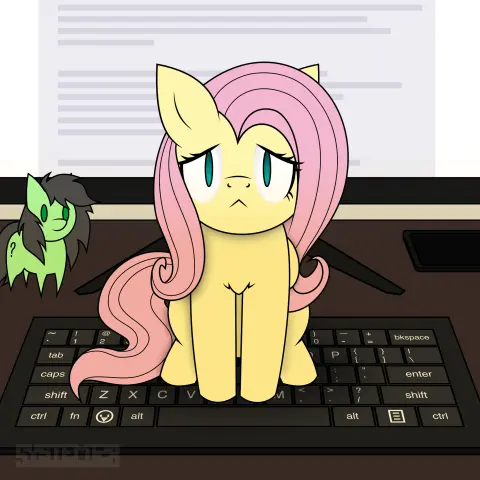 Fluttershy sits on a computer keyboard looking at the viewer, with a sad expression, whilst someone is using the computer.