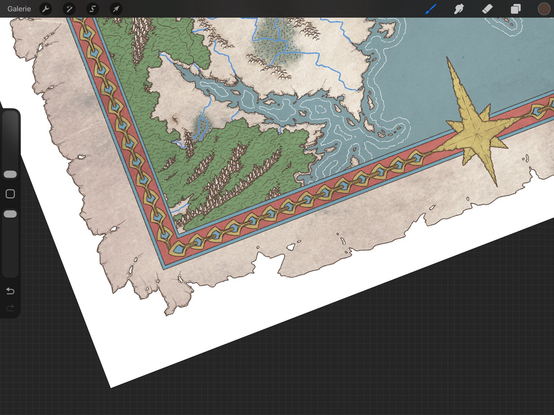 The corner of a map showing a torn parchment in progress and an ornate frieze with stylized peacock feathered pattern in red blue and gold. There’s also a rugged compass rose at the bottom of the map embedded in the ornate border.