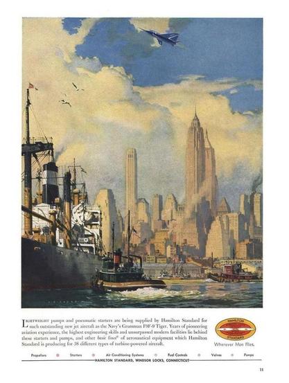 This advertisement for Hamilton Standard depicts a dramatic & optimistic postwar aviation scene, blending industry, progress, and modernity. In the foreground, a busy harbor bustles with activity — tugboats and cargo ships move through rippling water, their masts and smokestacks cutting into the hazy skyline. Thick clouds rise above the harbor, glowing gold and white in the afternoon light, symbolizing energy and innovation.
Dominating the background are the towering skyscrapers of New York City, their sharp lines and vertical height evoking ambition and the forward march of technology. Above them soars a sleek, blue Grumman F9F-9 Tiger jet fighter, banking gracefully across the sky — a symbol of speed, power, and American engineering.
The text below credits Hamilton Standard, based in Windsor Locks, Connecticut, for producing lightweight pumps and pneumatic starters used in aircraft like the Navy’s F9F-9 Tiger. It highlights the company’s pioneering aviation experience, precision engineering, and modern facilities, noting their work on 38 types of turbine-powered aircraft.
At the bottom, a clean row of product categories — Propellers, Starters, Air Conditioning Systems, Fuel Controls, Valves, and Pumps — underscores the firm’s technological breadth. To the right, Hamilton Standard’s red-and-gold oval logo appears beside the tagline: “Wherever Man Flies.”