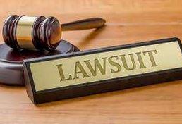 Lawsuit sign and gavel