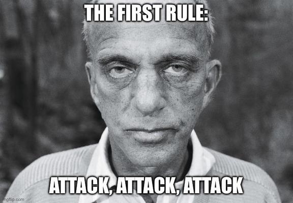 Picture of Roy Cohn staring directly into the camera, creating a very very unpleasant image.
The text says: The first rule: Attack, Attack, Attack