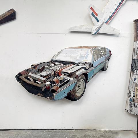 New work: "Gutted", a Lamborghini Espada project car built as a bas-relief covered in a mosaic of reused wood. Not painted, just assembled from my extensive collection of old doors and boards.
I just put it up on the wall for the first time which is always great moment!