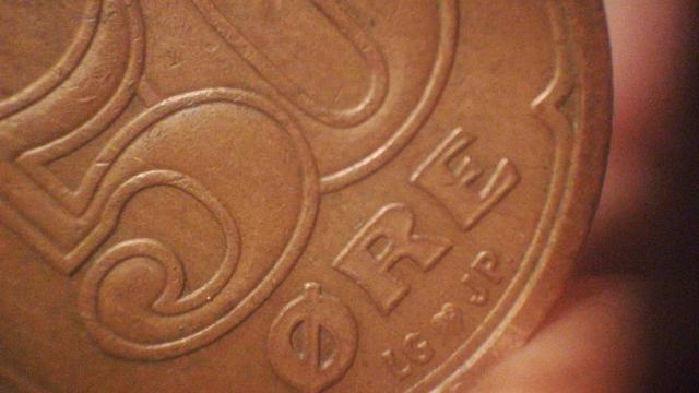 superduper close-up of a danish 50 øre coin.